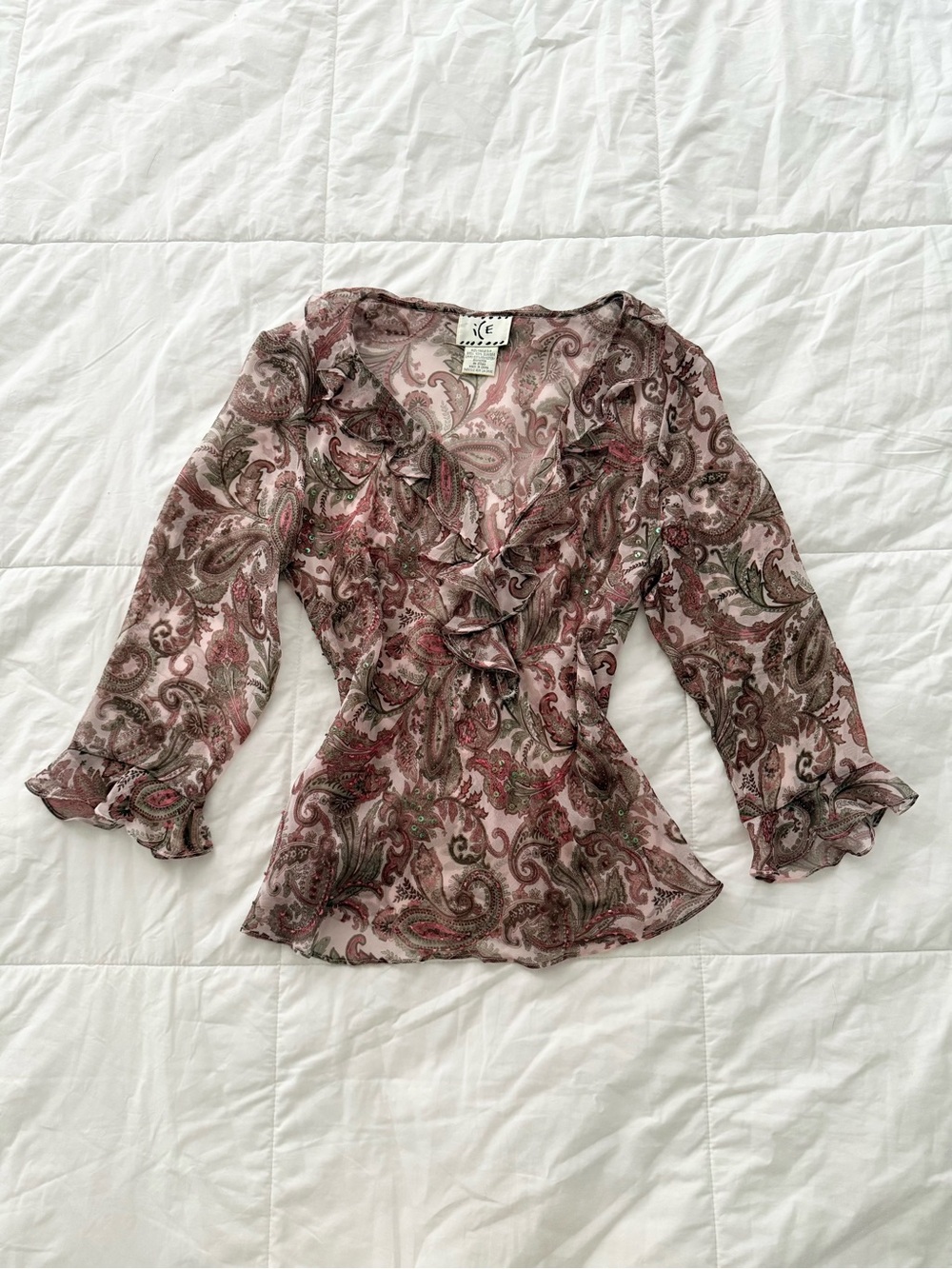 Ice pink 100% silk beaded paisley print blouse.